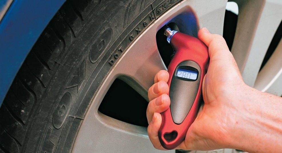 Checking tire pressure with a digital gauge